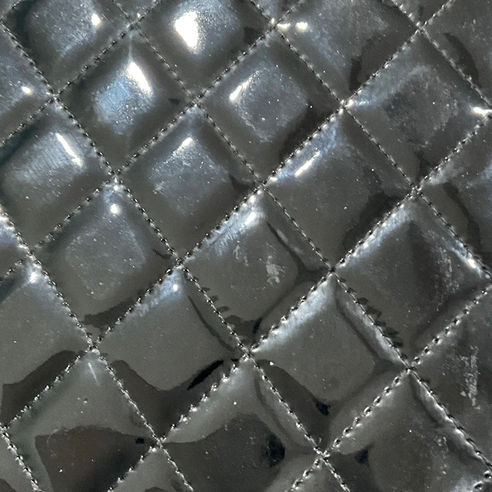 CHANEL Black Quilted Patent Leather Tablet Sleeve